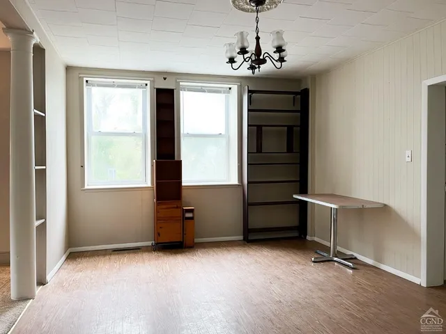 a view of a room with toys and a window