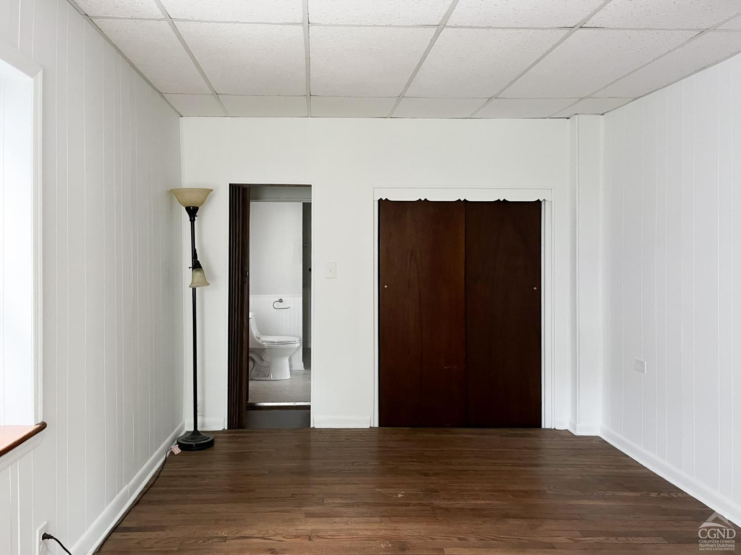 122 2nd Street, Unit 1 Athens, NY 12015 - Photo 23 of 26 a view of an empty room with closet and wooden floor