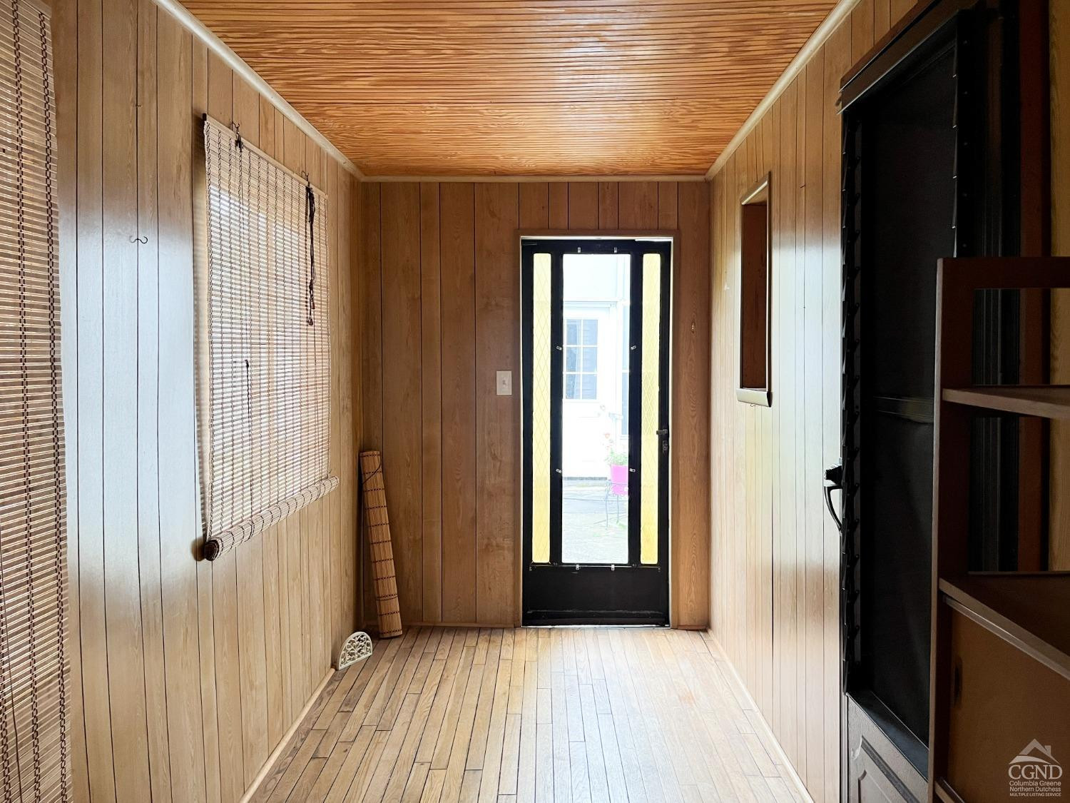 122 2nd Street, Unit 1 Athens, NY 12015 - Photo 25 of 26 a view of a hallway with wooden floor and staircase