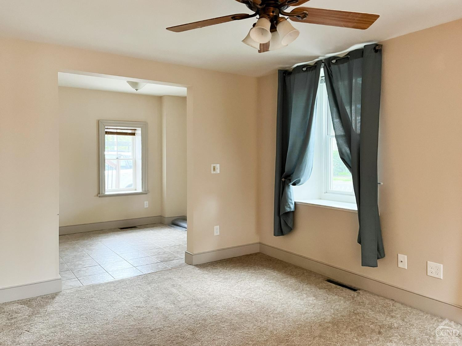 122 2nd Street, Unit 1 Athens, NY 12015 - Photo 6 of 26 an empty room with ceiling fan and window