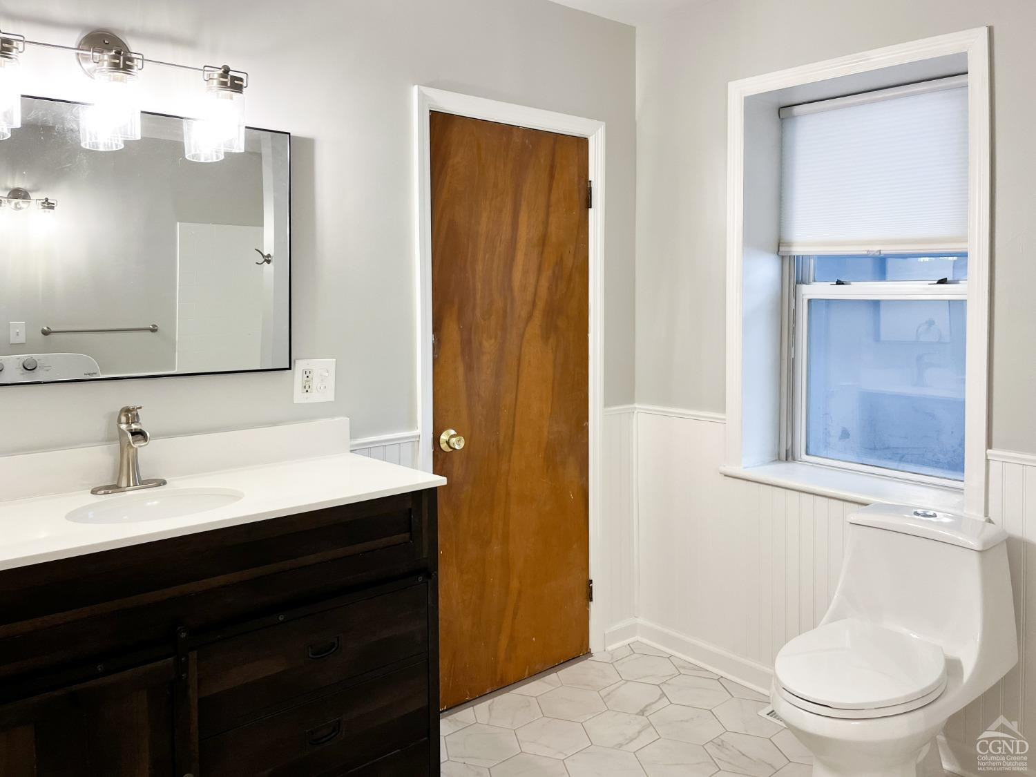 122 2nd Street, Unit 1 Athens, NY 12015 - Photo 9 of 26 a bathroom with a sink a toilet and shower