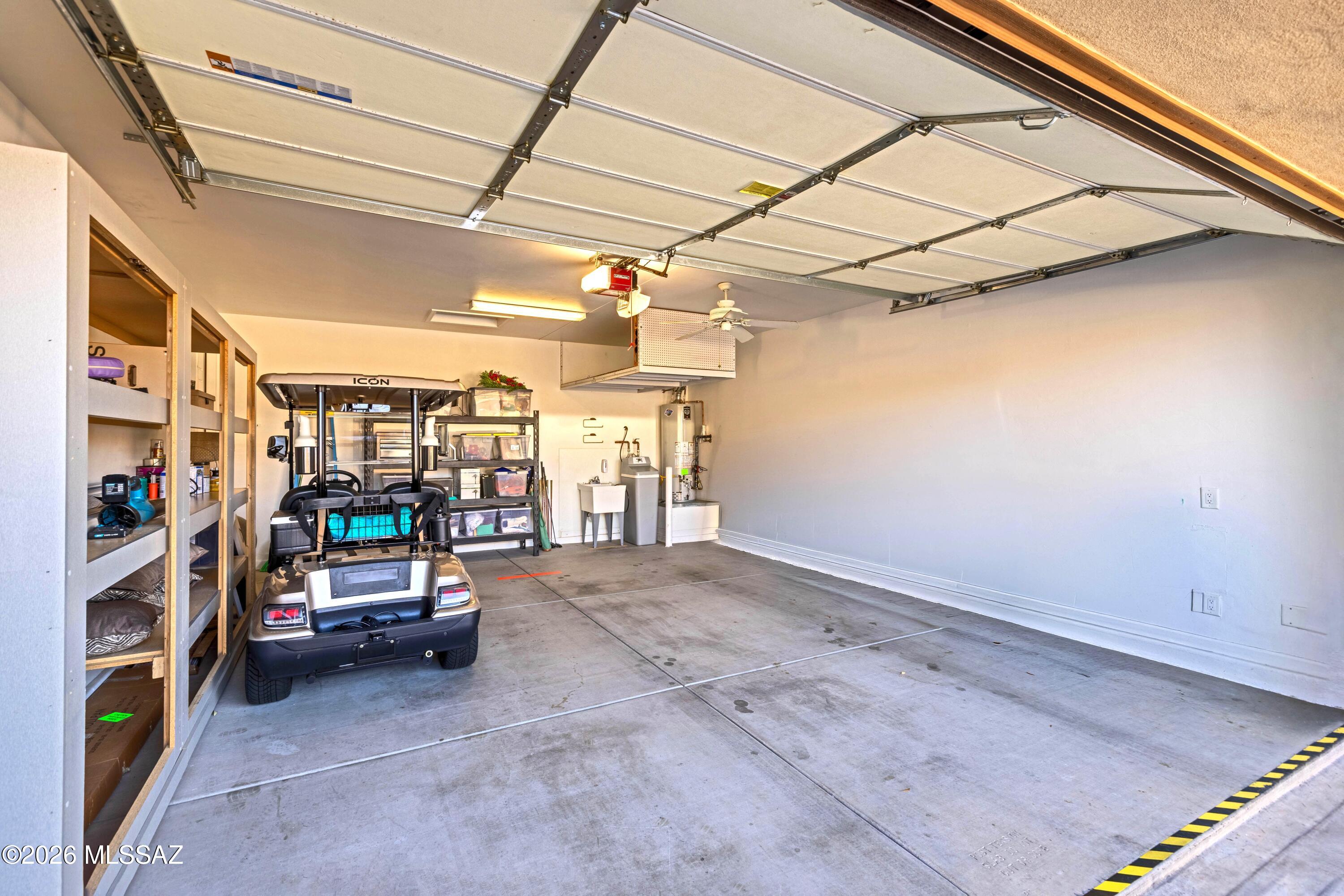 61347 East Shale Road Oracle, AZ 85623 - Photo 24 of 40 Garage w/ soft water unit and sink