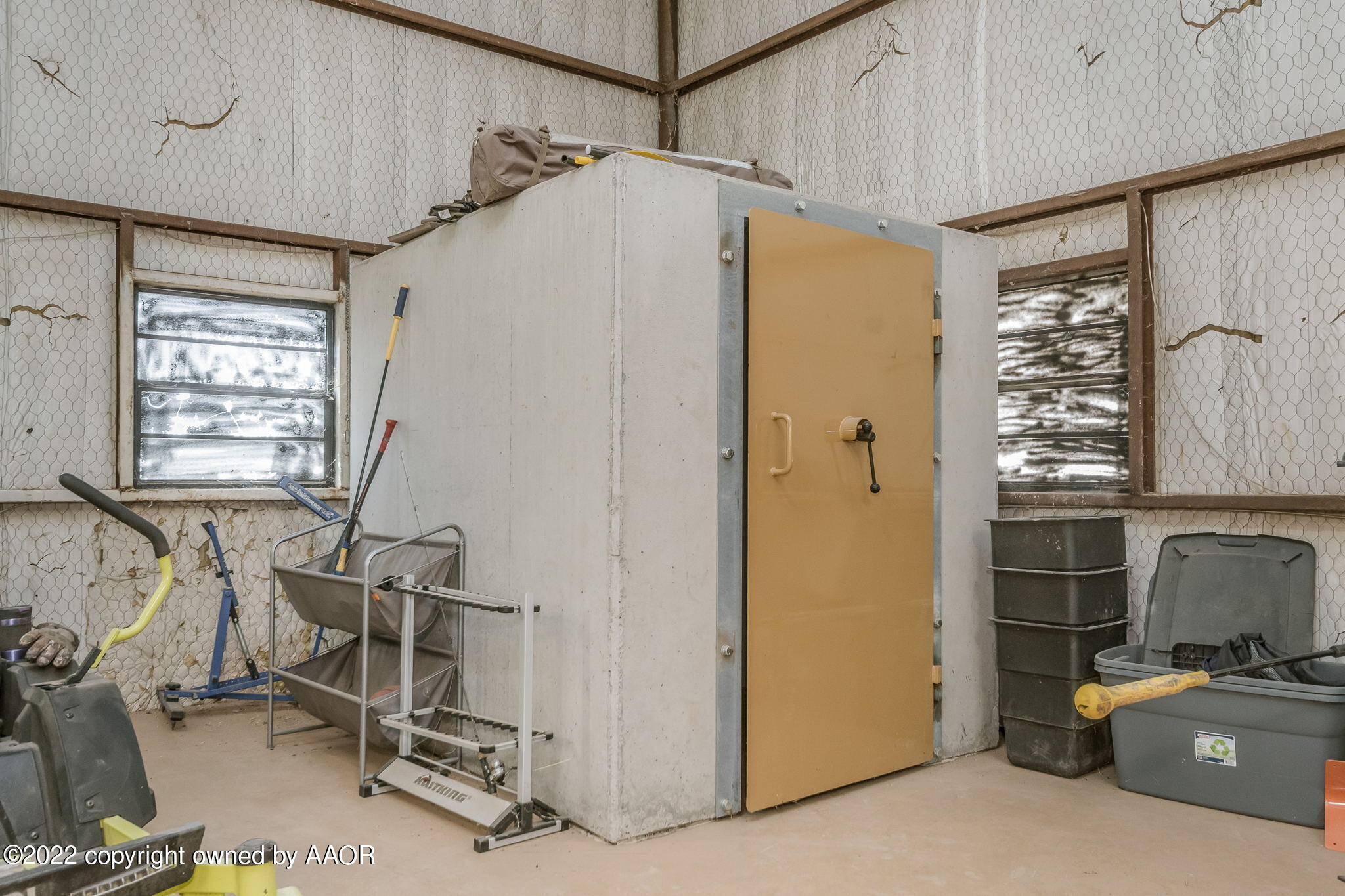 100 Alamo Street Claude, TX 79019 - Photo 12 of 39 a view of a storage & utility room with a window