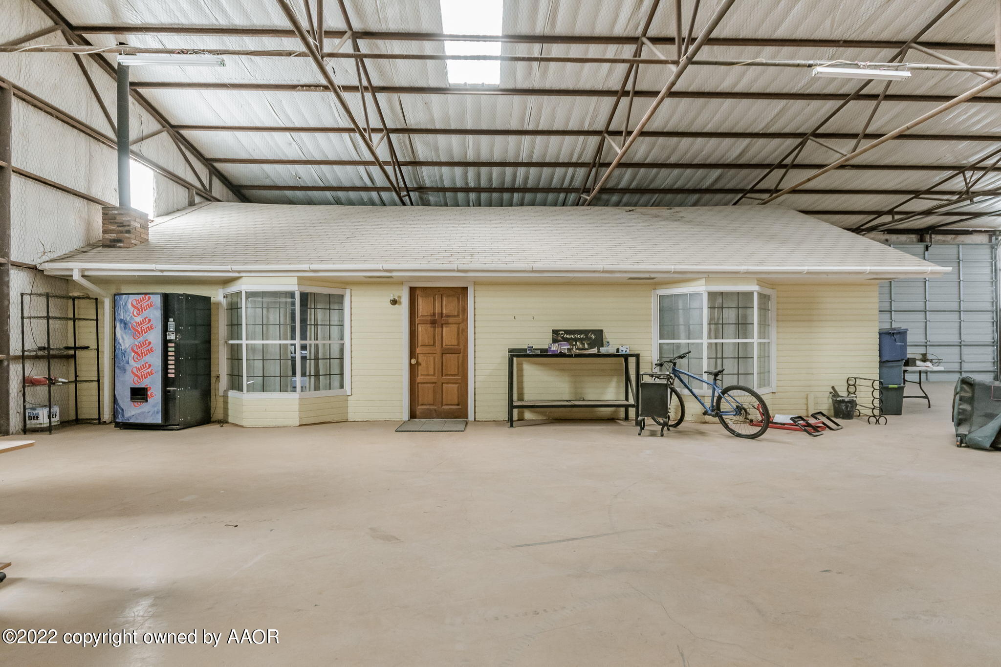100 Alamo Street Claude, TX 79019 - Photo 14 of 39 a view of garage with furniture