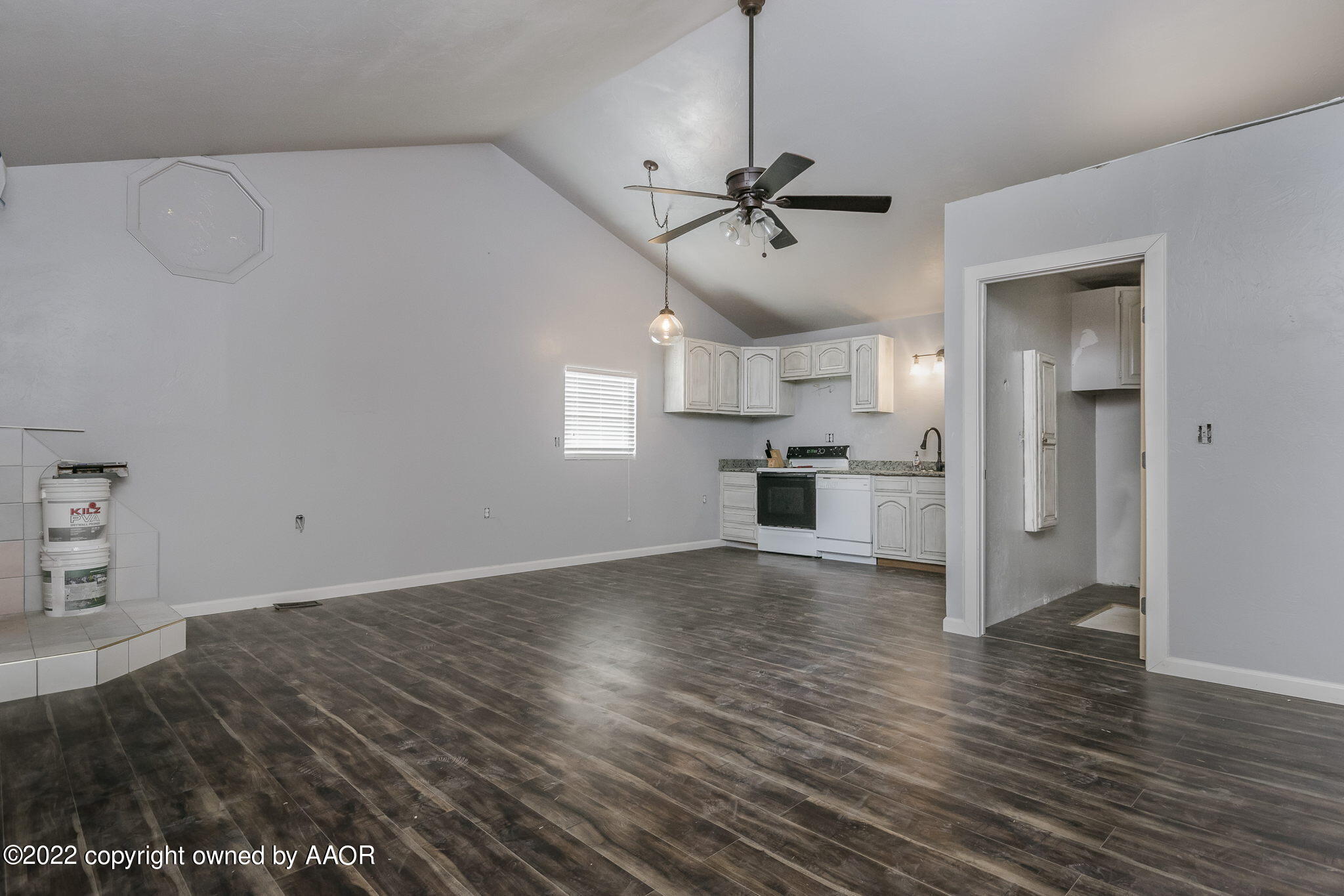 100 Alamo Street Claude, TX 79019 - Photo 15 of 39 a view of a kitchen with a sink and wooden floor