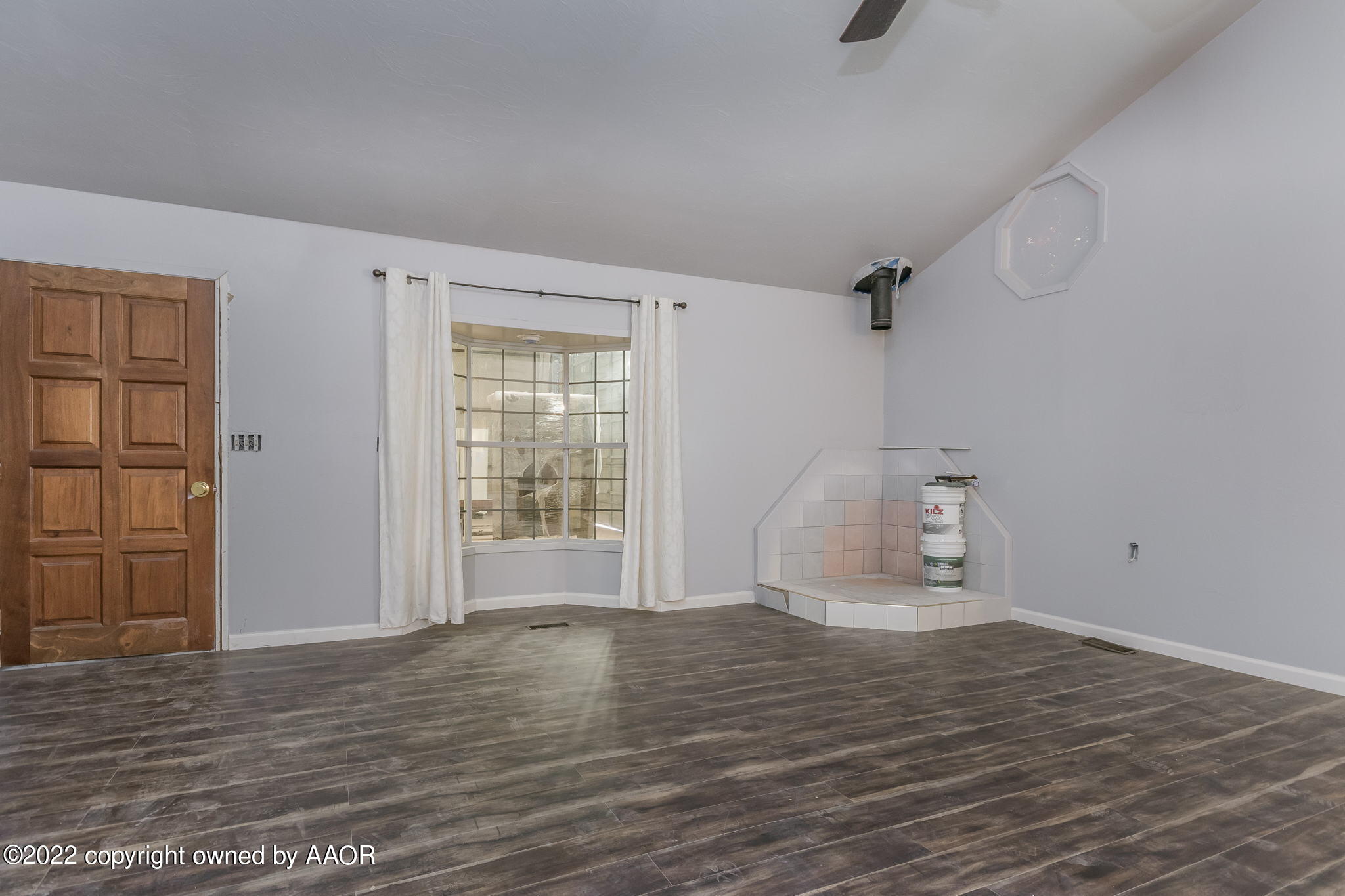 100 Alamo Street Claude, TX 79019 - Photo 16 of 39 a view of empty room with wooden floor