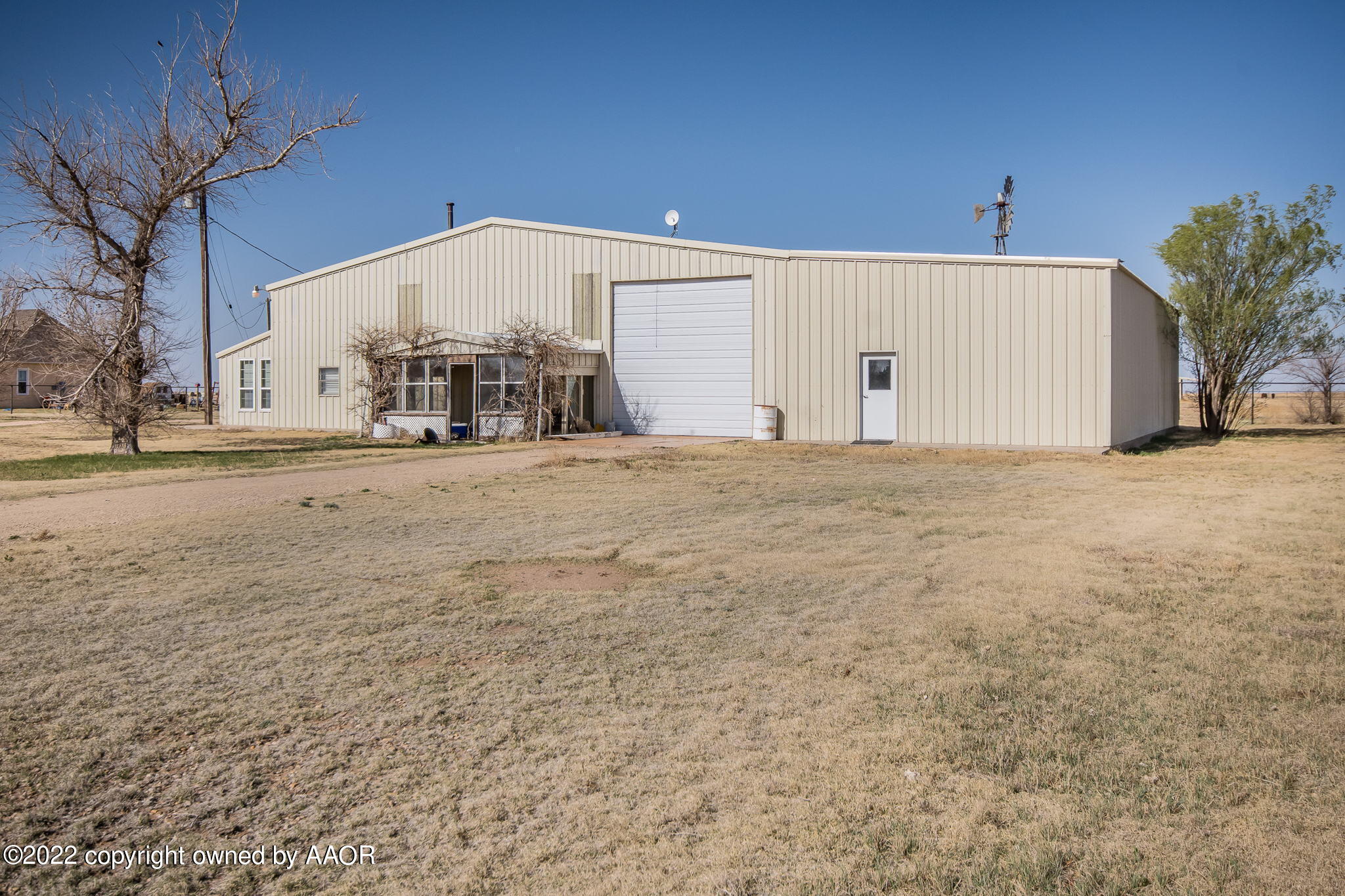 100 Alamo Street Claude, TX 79019 - Photo 2 of 39 a view of a house with a outdoor space