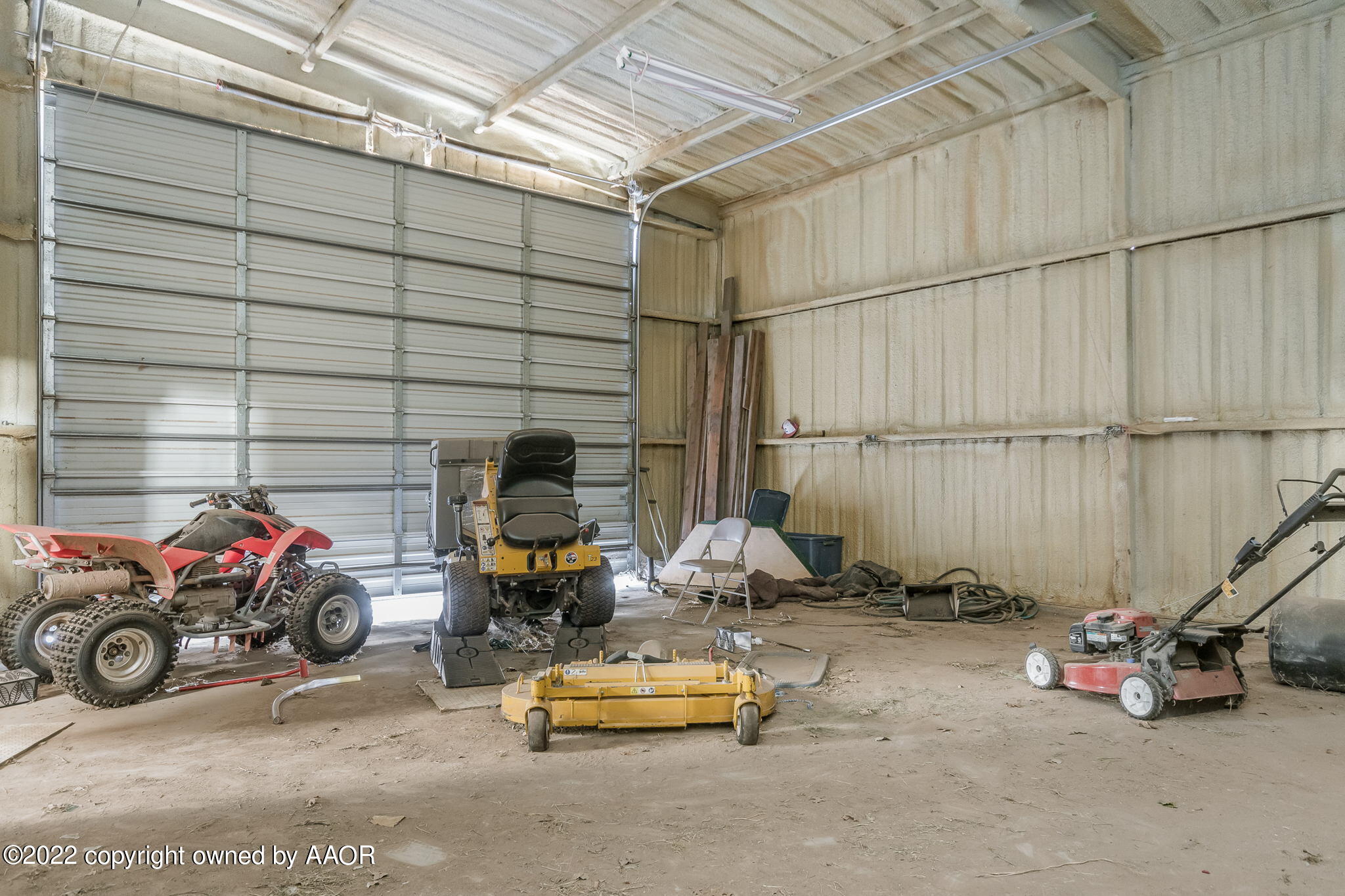 100 Alamo Street Claude, TX 79019 - Photo 10 of 39 a view of a garage with cars