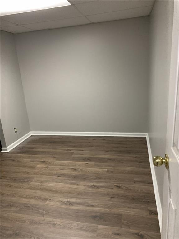 4235 Doubletree Court Cumming, GA 30040 - Photo 20 of 24 a view of an empty room with wooden floor