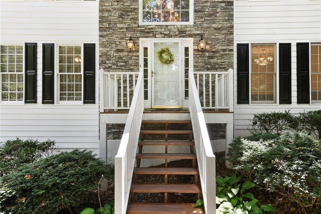 4235 Doubletree Court Cumming, GA 30040 - Photo 2 of 24 front view of a house with a window
