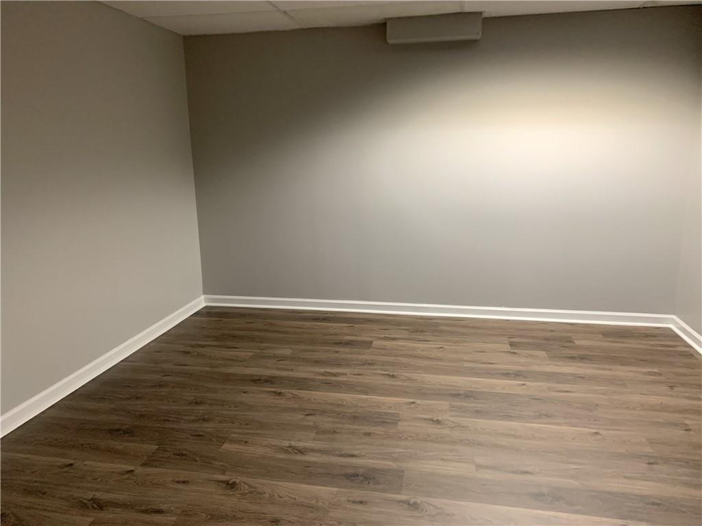 4235 Doubletree Court Cumming, GA 30040 - Photo 21 of 24 a view of room with wooden floor