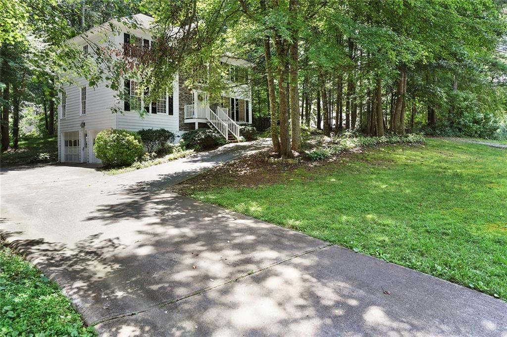 4235 Doubletree Court Cumming, GA 30040 - Photo 23 of 24 a view of a park with large trees