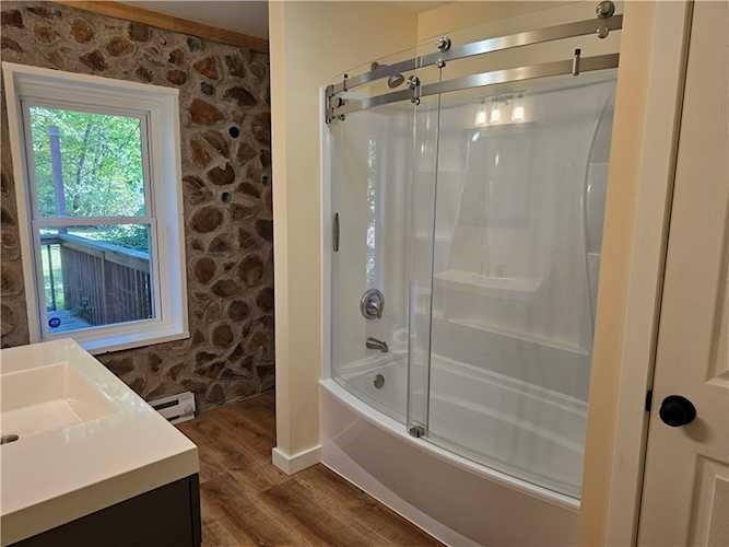176 Kay Road Harrisville, PA 16038 - Photo 7 of 24 a bathroom with a shower and a sink