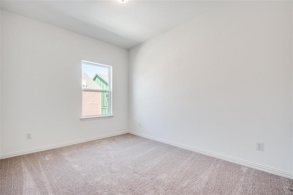 9915 Schramm Street Irving, TX 75063 - Photo 11 of 12 an empty room with a window