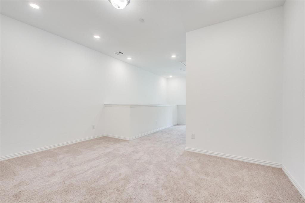 9915 Schramm Street Irving, TX 75063 - Photo 10 of 12 a view of an empty room