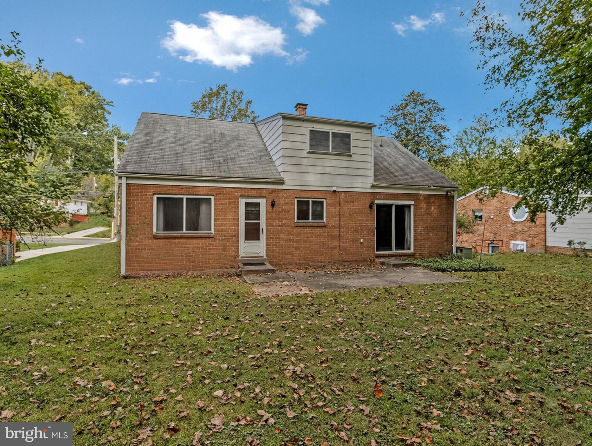 702 Lamberton Drive Silver Spring, MD 20902 - Photo 16 of 17 a view of a house with a yard