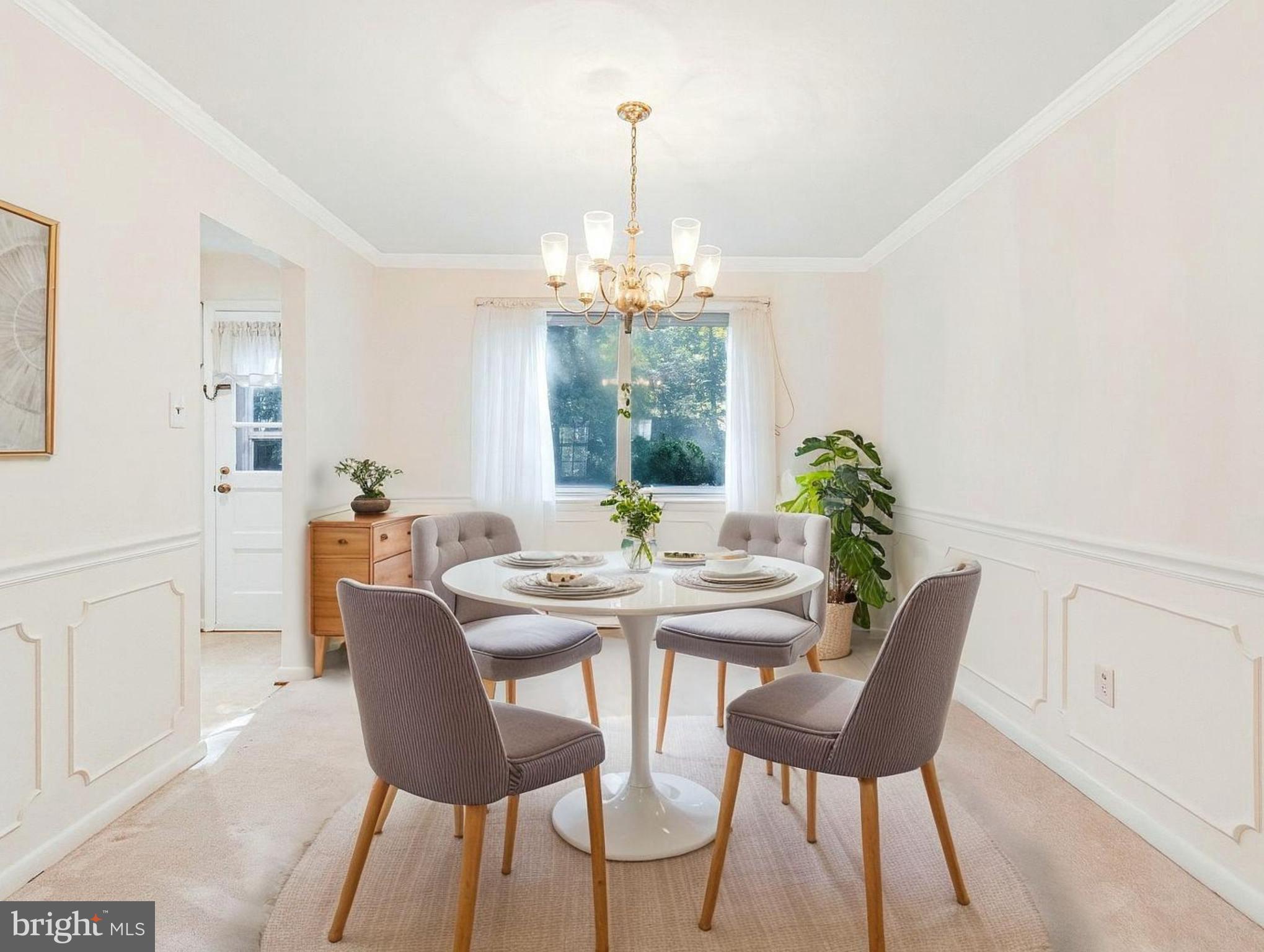 702 Lamberton Drive Silver Spring, MD 20902 - Photo 4 of 17 a view of a dining room with furniture window and outside view