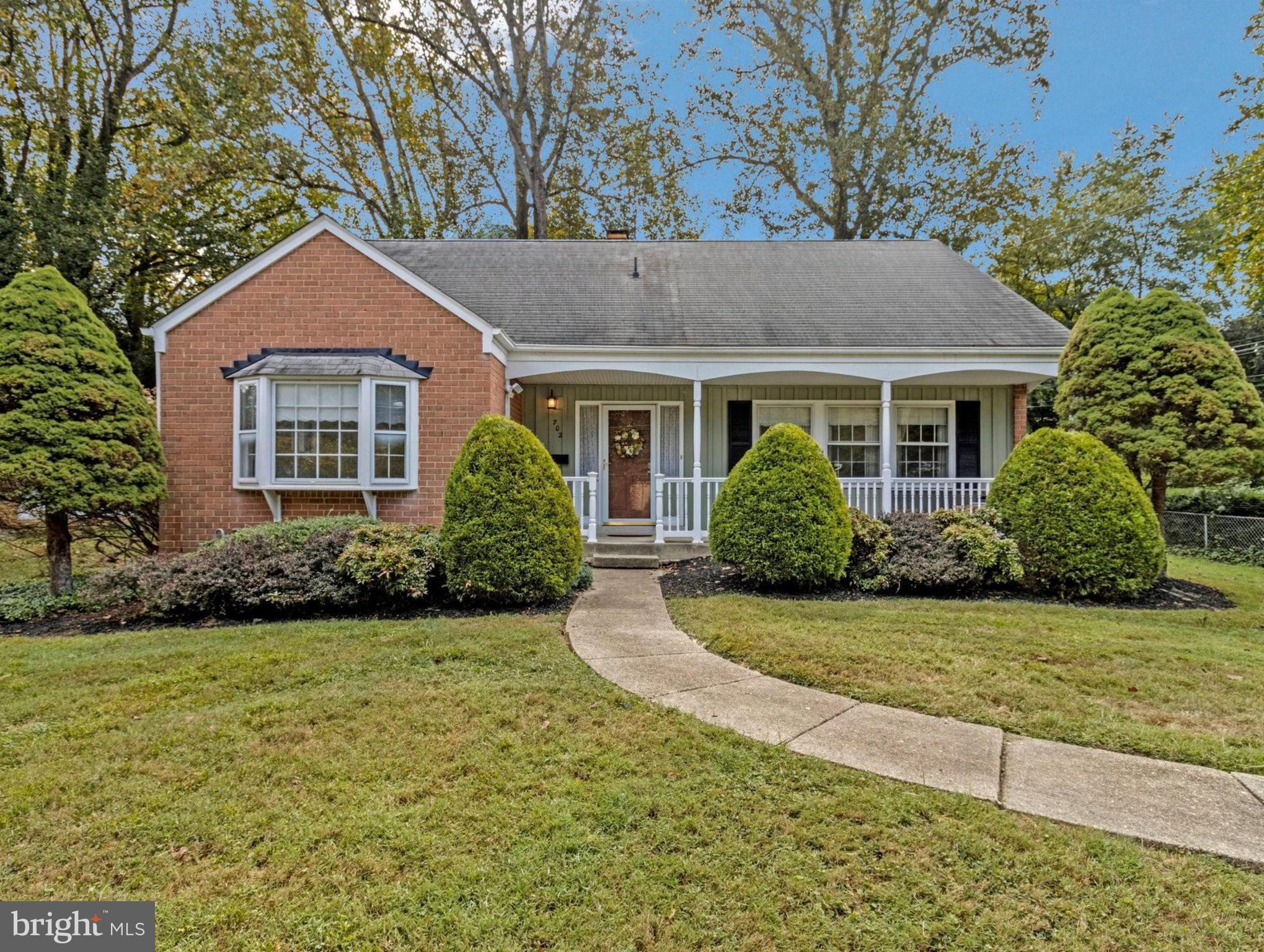 702 Lamberton Drive Silver Spring, MD 20902 - Photo 6 of 17 a front view of a house with a yard