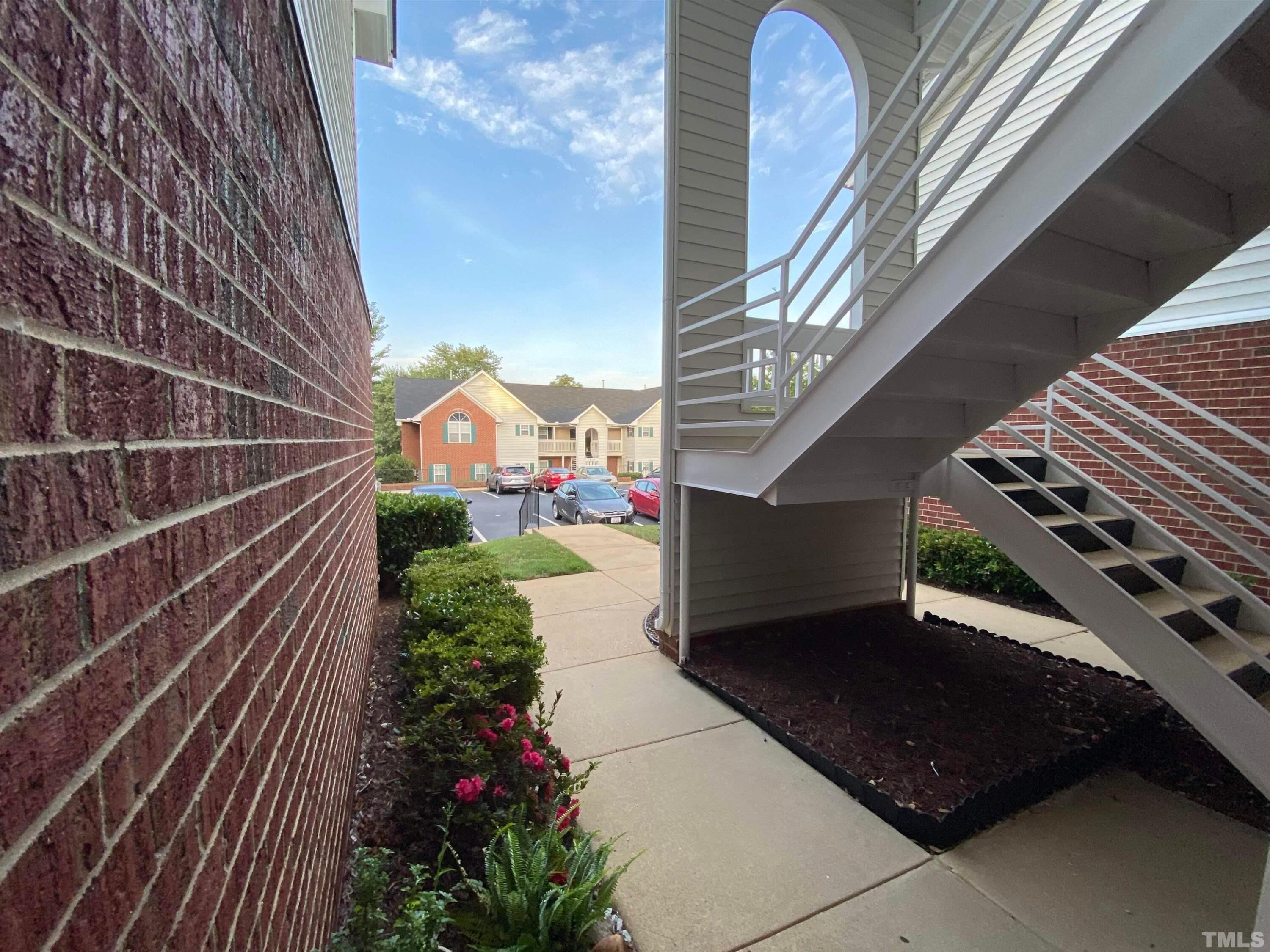 2413 Wellington Ridge Loop, Unit 2413 Cary, NC 27518 - Photo 3 of 30 a view of a balcony with an outdoor space