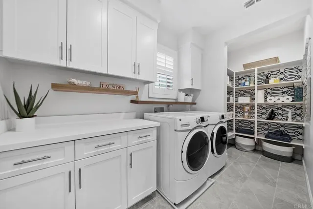 a spacious bathroom with a bathtub and a shower