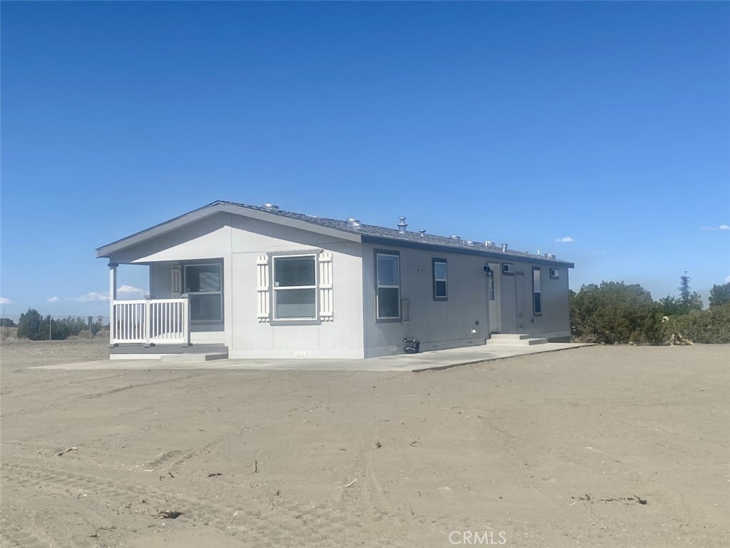 10225 Beekley Road Phelan, CA 92371 - Photo 1 of 1 a view of a house with a outdoor space