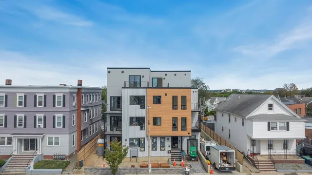 a view of a city with tall buildings