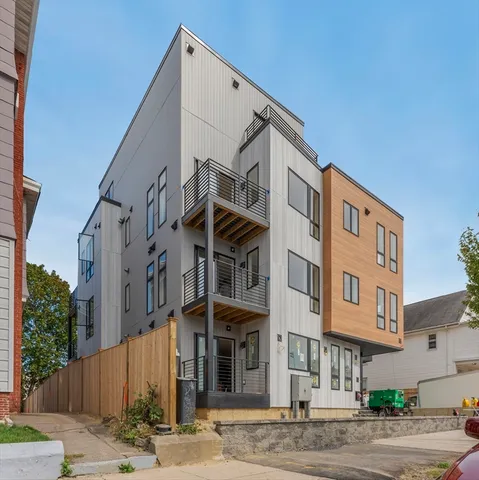 a front view of a building with street view