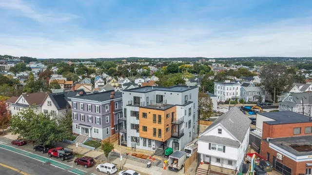 an aerial view of a house with a garden view