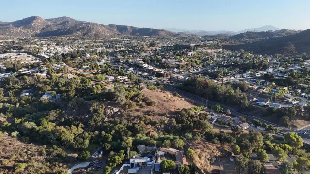 an aerial view of residential house and green space