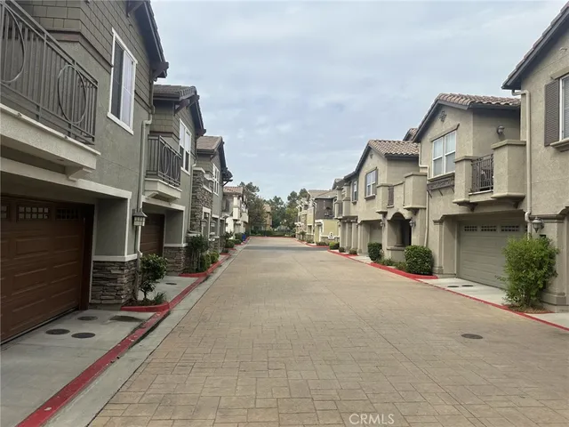 a park view with a bench and trees