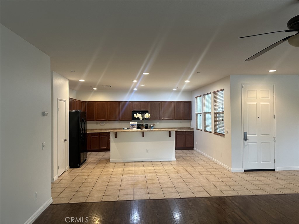 10375 Church Rancho Cucamonga, CA 91730 - Photo 2 of 22 a view of kitchen with refrigerator sink and microwave