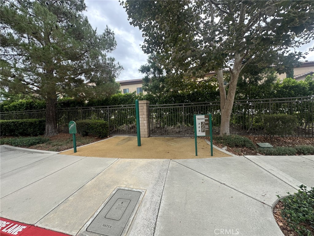 10375 Church Rancho Cucamonga, CA 91730 - Photo 21 of 22 a park view with a bench and trees