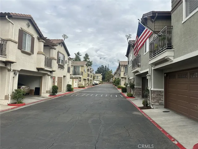 a view of a street with buildings