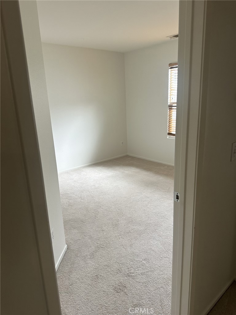 10375 Church Rancho Cucamonga, CA 91730 - Photo 9 of 22 an empty room with windows