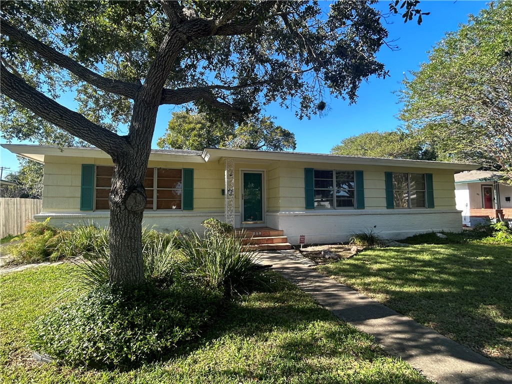 626 Bermuda Place Corpus Christi, TX 78411 - Photo 1 of 22 front view of a house with a yard