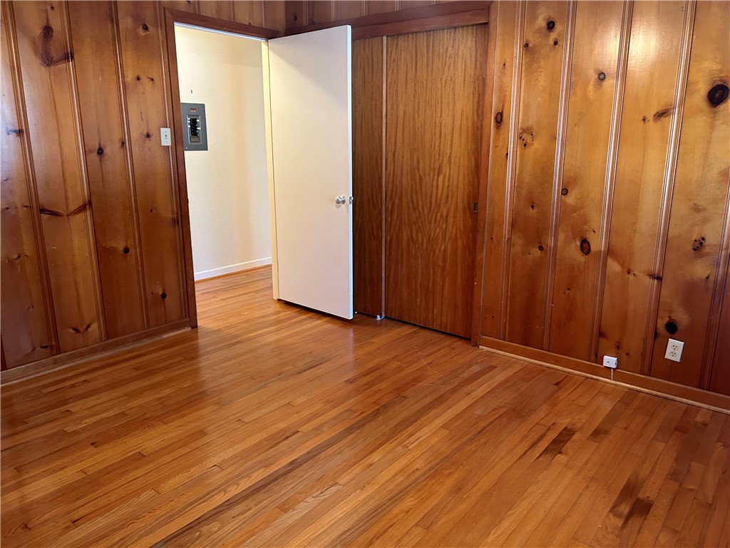 626 Bermuda Place Corpus Christi, TX 78411 - Photo 11 of 22 a view of an empty room with wooden floor