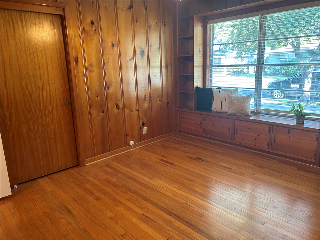 626 Bermuda Place Corpus Christi, TX 78411 - Photo 10 of 22 a view of empty room with wooden floor and fan