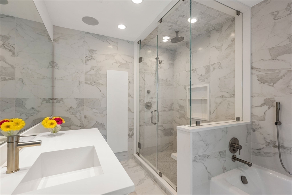 244 Heath Street Brookline, MA 02467 - Photo 17 of 36 a bathroom with a sink a toilet and a bathtub