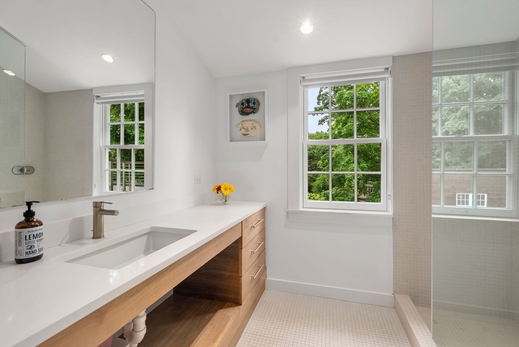 244 Heath Street Brookline, MA 02467 - Photo 21 of 36 a kitchen with sink and window