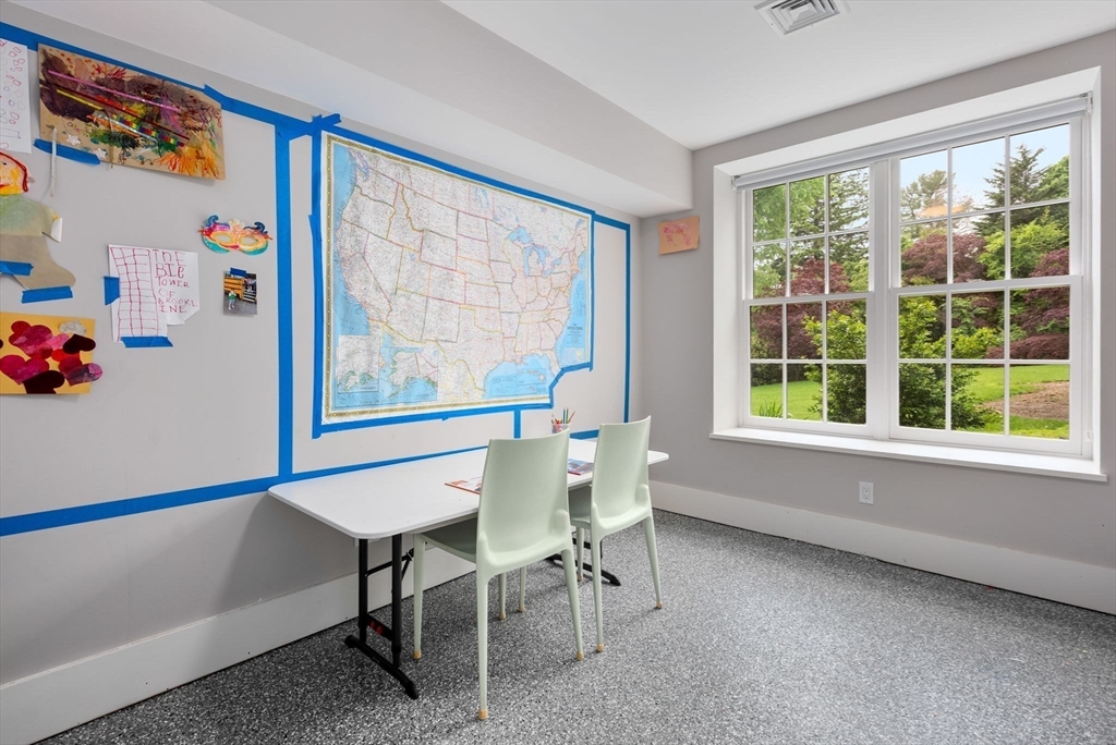 244 Heath Street Brookline, MA 02467 - Photo 25 of 36 a workspace with furniture and a window