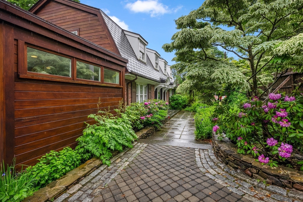 244 Heath Street Brookline, MA 02467 - Photo 29 of 36 a view of a pathway that has potted plants