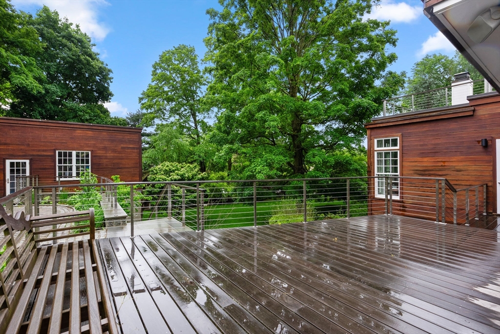 244 Heath Street Brookline, MA 02467 - Photo 31 of 36 a view of house with backyard and sitting area