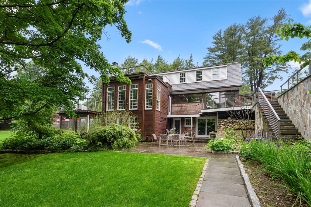 244 Heath Street Brookline, MA 02467 - Photo 33 of 36 a front view of a house with garden