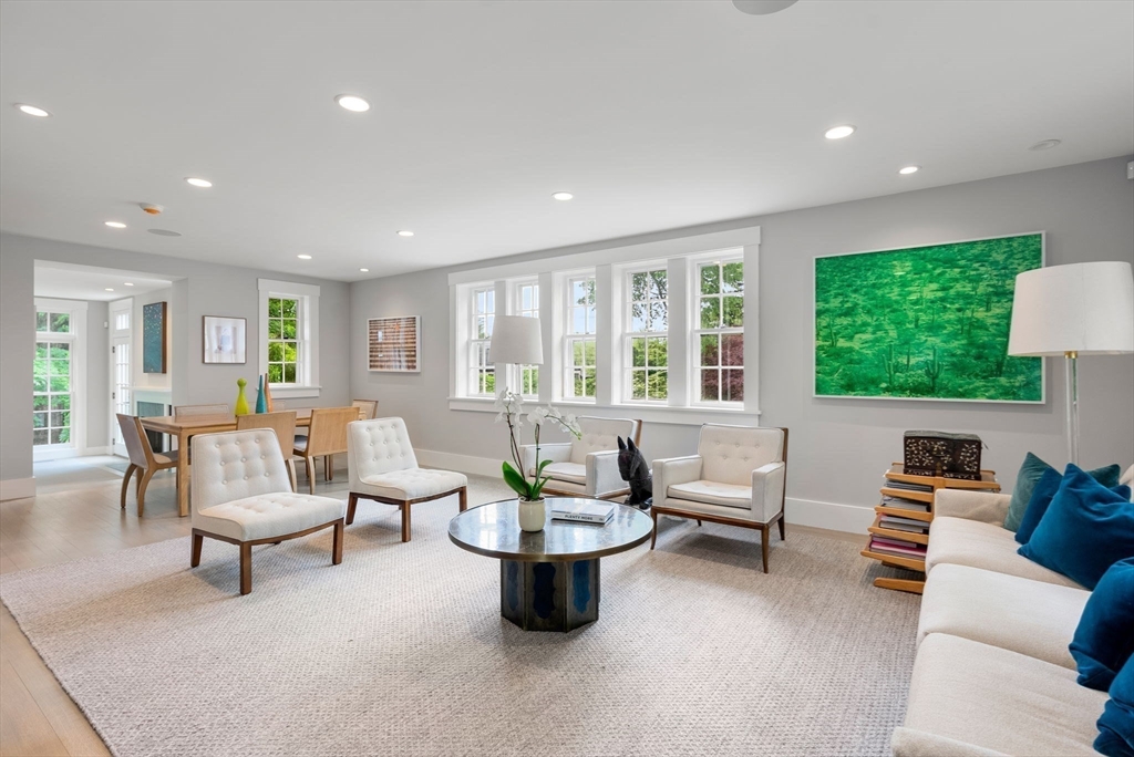 244 Heath Street Brookline, MA 02467 - Photo 10 of 36 a living room with furniture and a large window