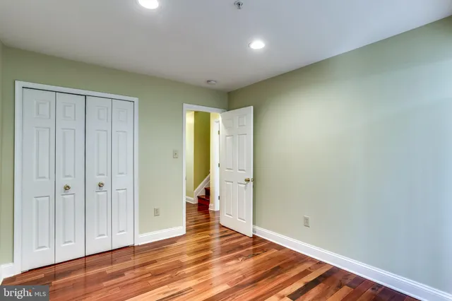a view of room with hardwood floor
