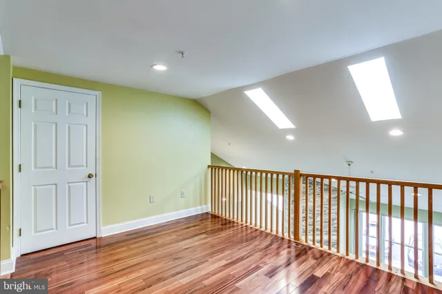 a view of a big room with wooden floor