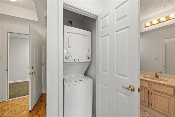 a bathroom with a toilet sink and shower