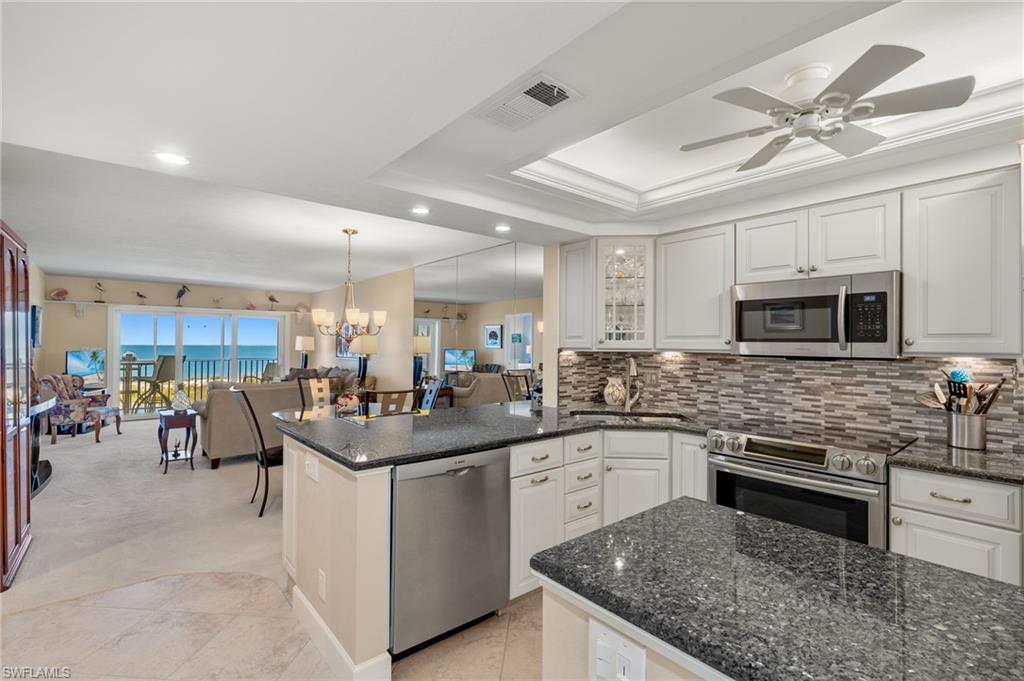 What More Can You Ask For? Beautiful Tile, Large Baseboard, Updated Kitchen and Views of the Gulf!