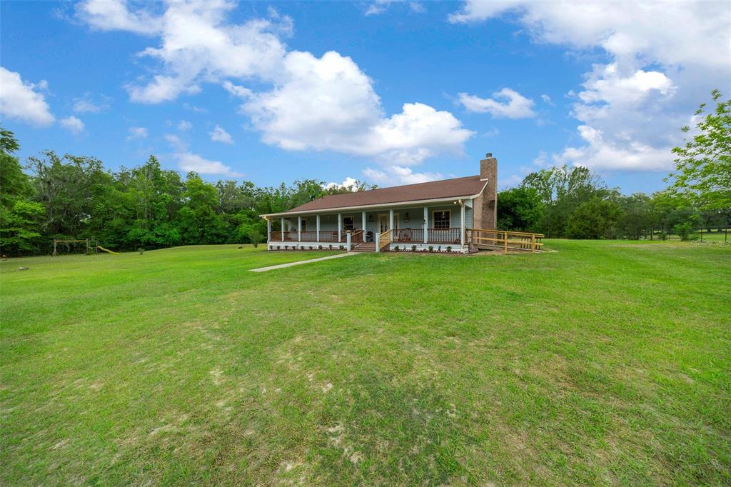 732 Carl Wilson Road Fort White, FL 32038 - Photo 52 of 80 a view of a house with a big yard