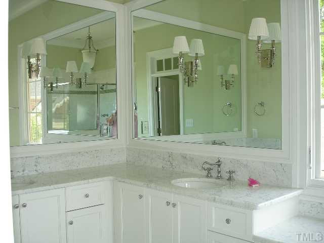 5326 Landguard Drive Raleigh, NC 27613 - Photo 13 of 17 Enjoy this large spa-style master bath. Dual sinks, plenty of drawer and cabinet space. European style toilet,white carrara marble countertops and porcelain sinks. Master Bath/Spa